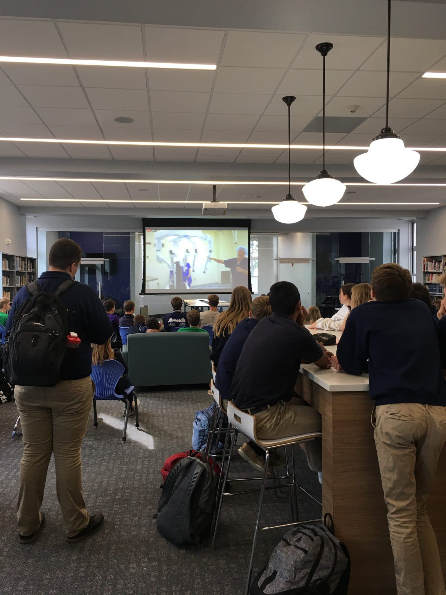 Courtesy Photo | Students at Thomas More Prep-Marian Junior/Senior High in Hays watch the live demonstration in their new learning commons.
